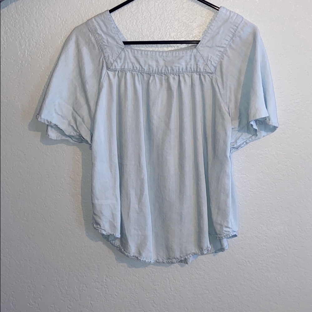 a light blue shirt